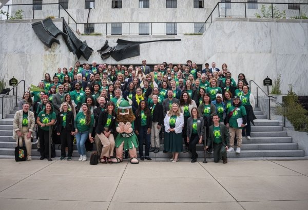 group of students in front of building